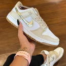 Tênis Nike Dunk Low Dourado