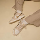 Tênis Nike Dunk Low Dourado